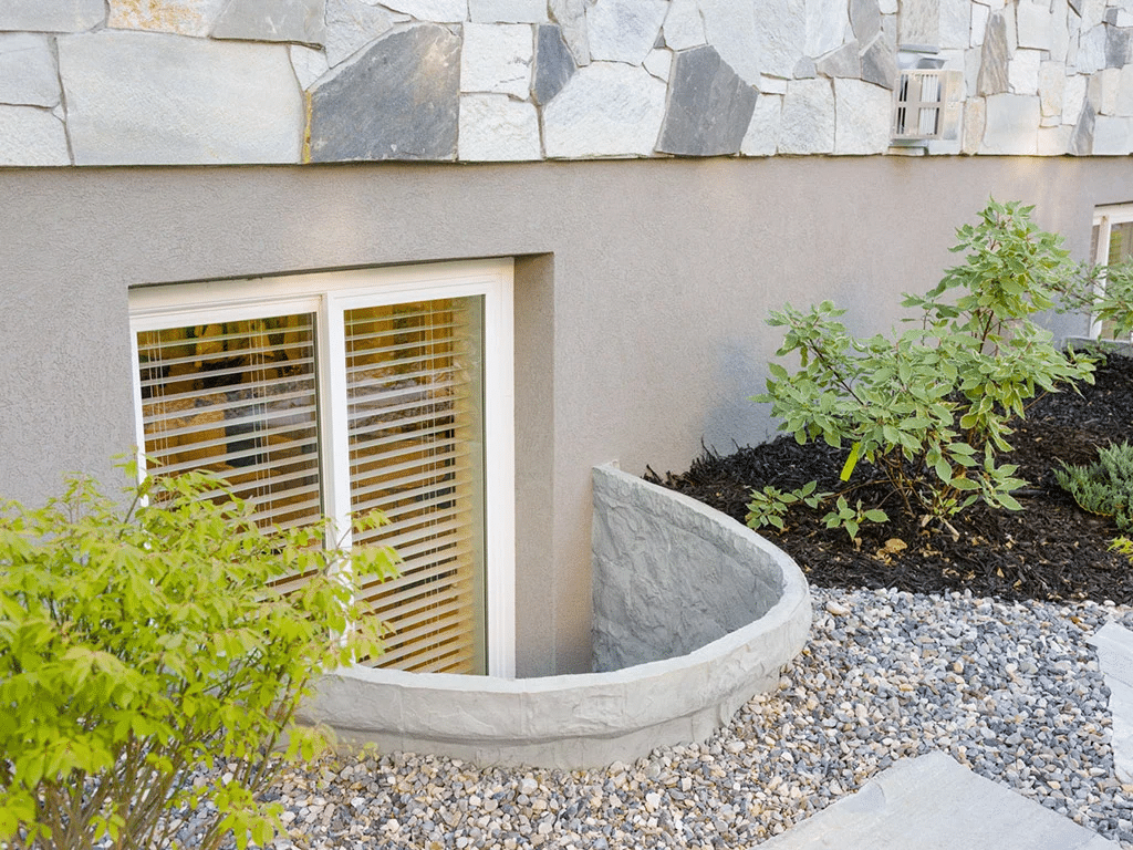 Basement egress window with window well