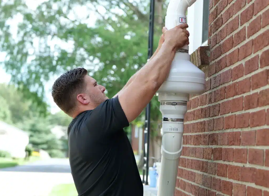 Radon mitigation system installed in a basement